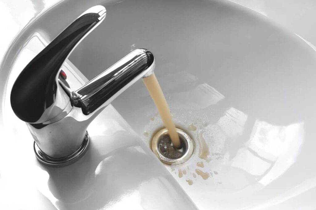 Dirty water from the well is brown and may be due to rust or iron.